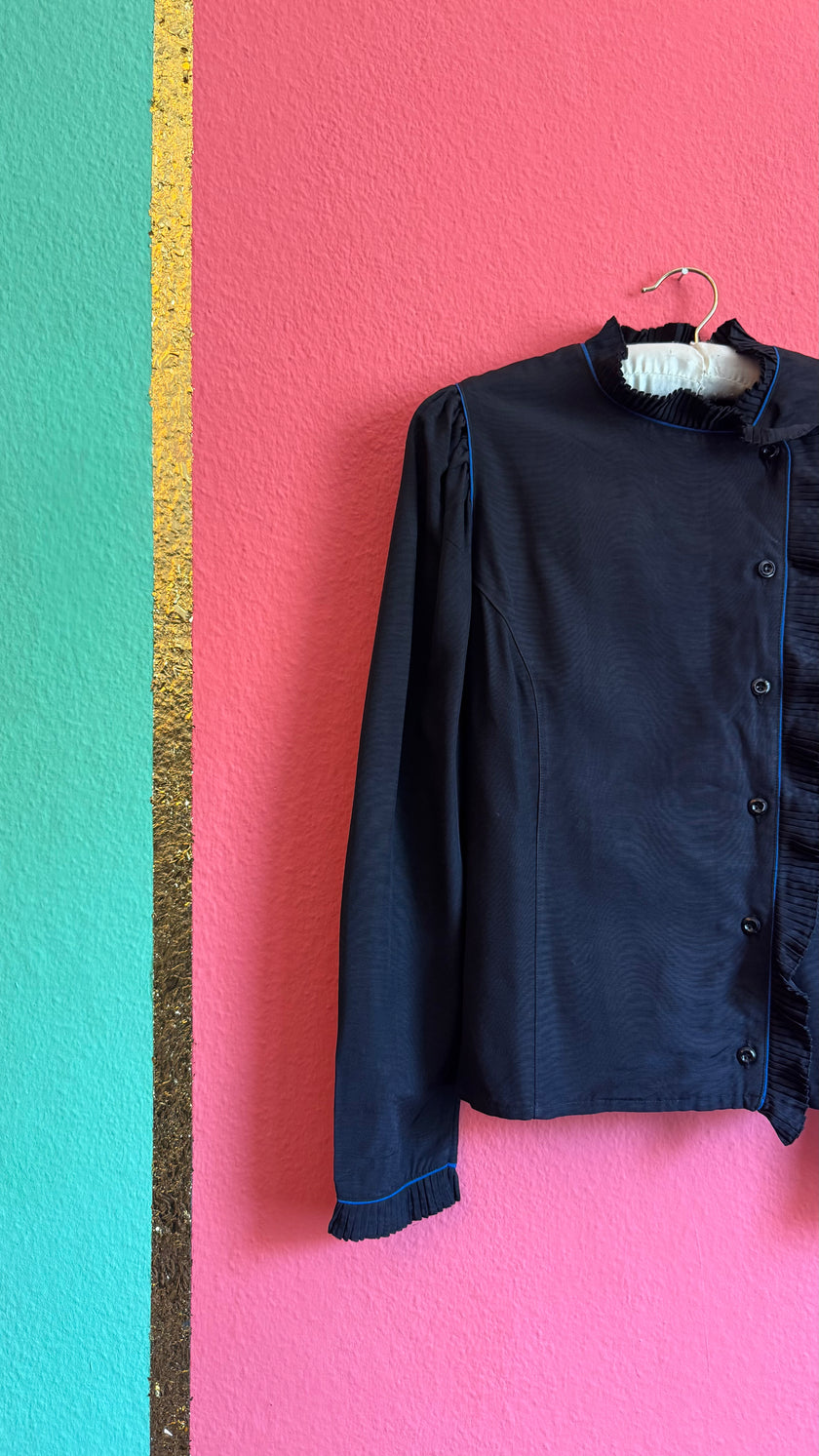 Black Ruffle Blouse With Blue Piping