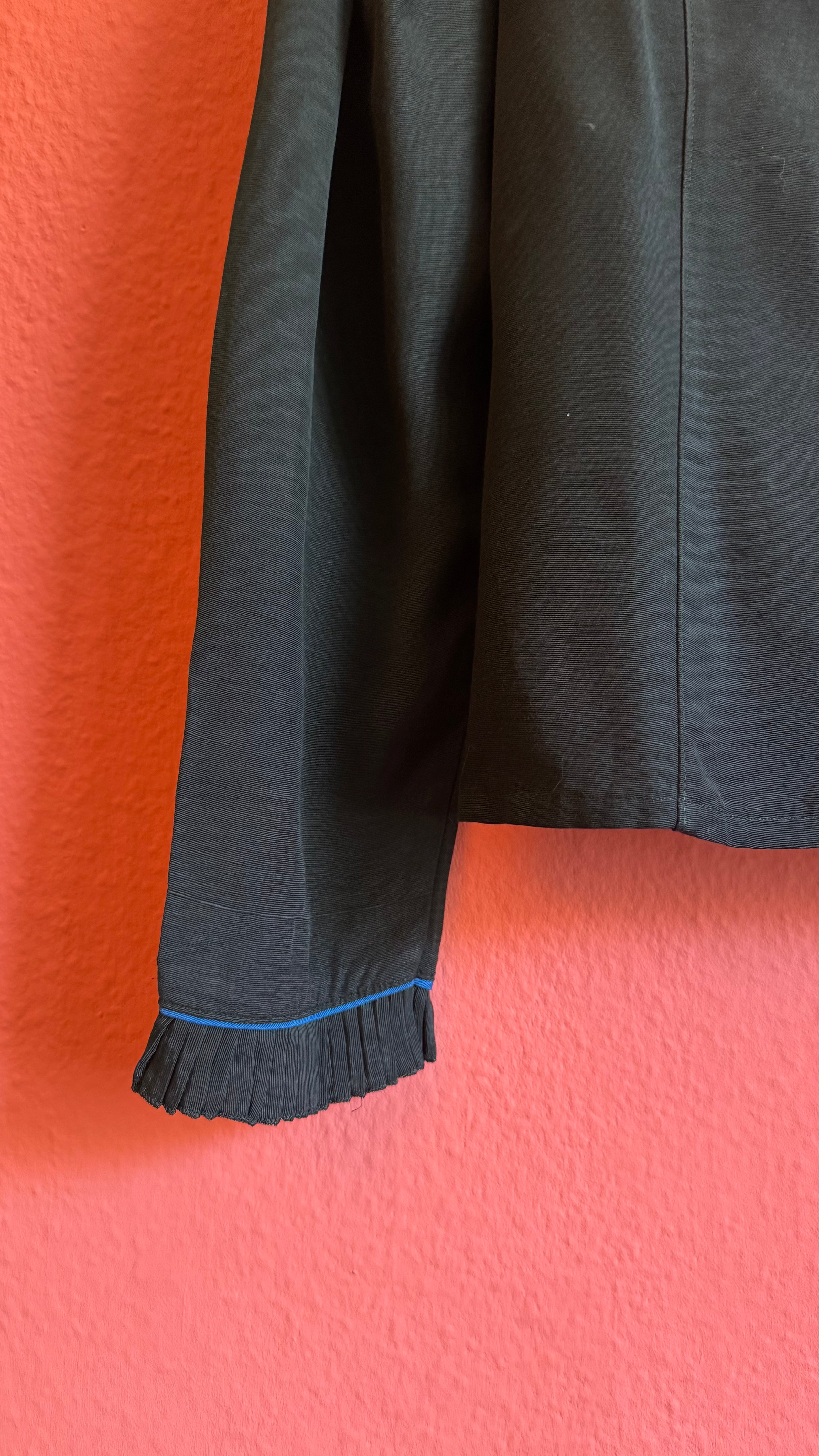 Black Ruffle Blouse With Blue Piping