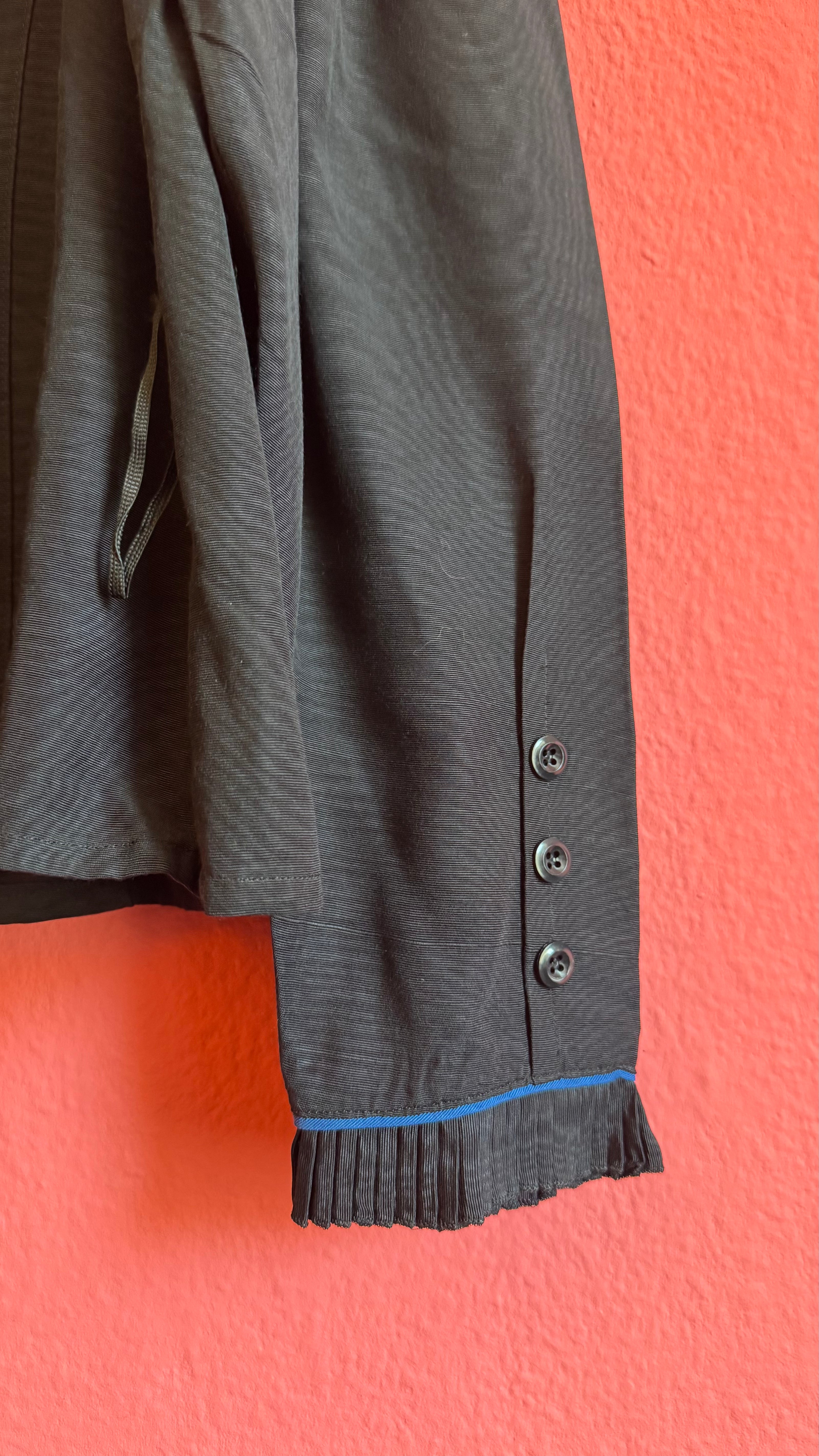Black Ruffle Blouse With Blue Piping